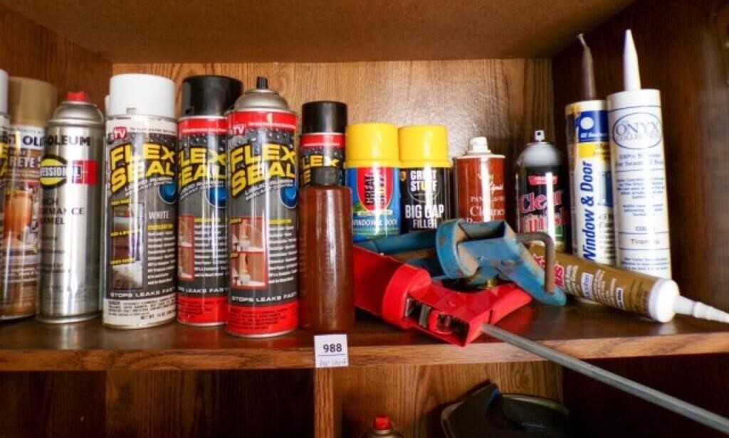 Top shelf contents- Flex Seal spray, caulking guns