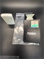 WHITE ZIPPO LIGHTER WITH GREY LETTERING