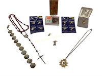 Religious costume jewelry - pins, necklaces,