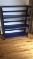 Folding blue wooden shelf