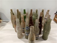 Twenty-Three Vintage Soda Bottles