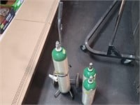 3 oxygen Bottles and rolling carrier