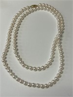 Strand of Pearls with 14K Clasp