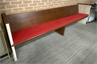 WOOD CHURCH PEW WITH RED CUSHION