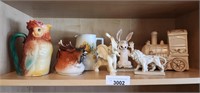 Shelf with Pottery Figurines Pitchers