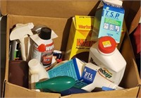 Box with cleaning supplies