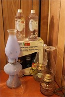 Vintage Oil Lamps and bottles of Lamp Oil