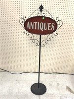 Metal sign. 48x19. Antiques.