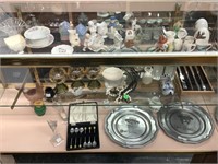 Assorted collectibles and decor items. Display