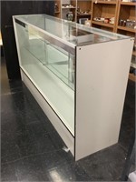 Glass front display case. 70x38x17.
