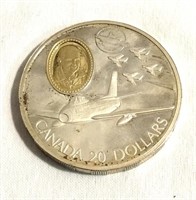 1997 Canadian .925 Silver w/ 24k gold $20 coin.
