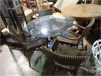 GLASS TOP PATIO TABLE W/4 WOVEN CHAIRS