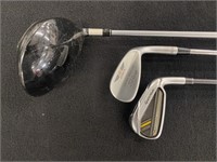 Group of Titleist and Taylormade Golf Clubs