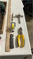 Pliers, tape measure, screwdrivers, heat gun