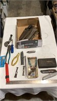 Hand files, utility knives, Philmore screwdriver,