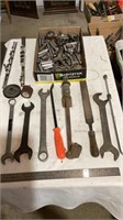 Hand file, wrenches, various sockets.