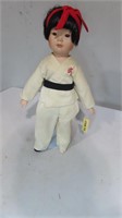 ceramic Chinese doll with stand