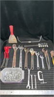 Various wrenches, fishing weights