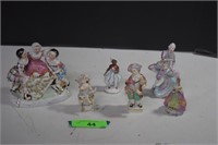 Six Porcelain Figurines. Two w/Small Chips