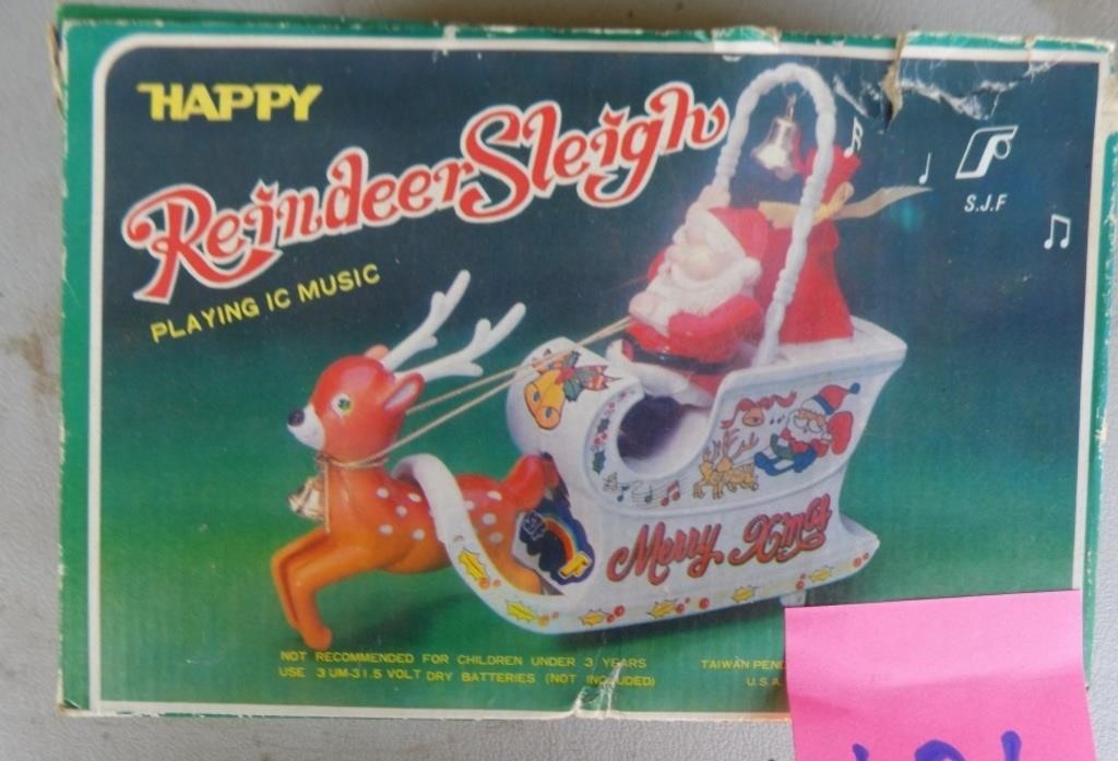 Happy Reindeer Sleigh Plays Music
