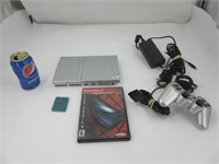 Console Playstation 2 avec jeu + accessoires,