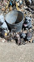 Acrylic yard art in galvanized bucket eight items