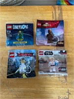 Four LEGO figures new sealed
