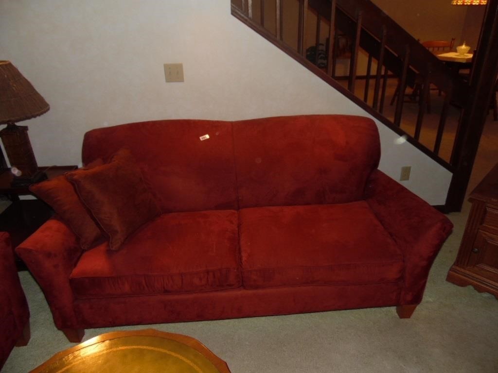 COUCH AND MATCHING LOVE SEAT IN BASEMENT