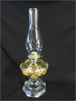 A Pressed Glass Oil Lamp With Glass Chimney