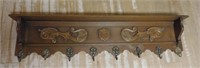 Shield and Acanthus Applique Oak Wall Rack.