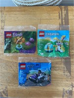Three small packs of Legos brand new sealed