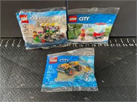Three small packs of Legos brand new sealed