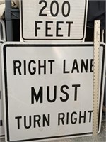 2 Road Signs 200 Feet, Right Lane Must Turn Right