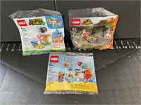 Three small packs of Legos new sealed