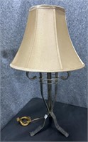 Table top lamp with tan/gold shade   
Height: 33”