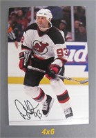 Signed Doug Gilmour #93 post card.