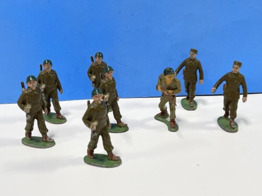 7 Cast Aluminum Toy Soldiers. No maker indicated