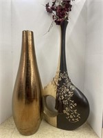 Two decorative vases. 24” and 27”. One has