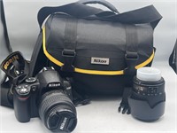 Nikon D3000 camera & dx lens bag & more