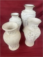 Two pairs of matching vases. Between 9.5” and