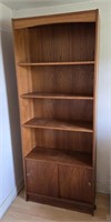 Midcentury Bookshelf With Sliding Door Compartment