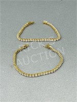 2 Gold tone & clear stone bracelets