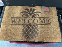 Pineapple welcome that has holes in the back.