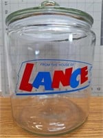 Glass cookie jar,  "Lance" approx 10" with lid