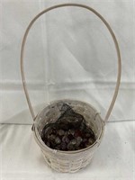 Small basket with glass marbles for floral