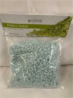 Brand new bag of decorative aqua colored pebbles