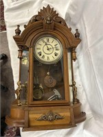 Antique Gilbert wall clock. 24 inches tall.