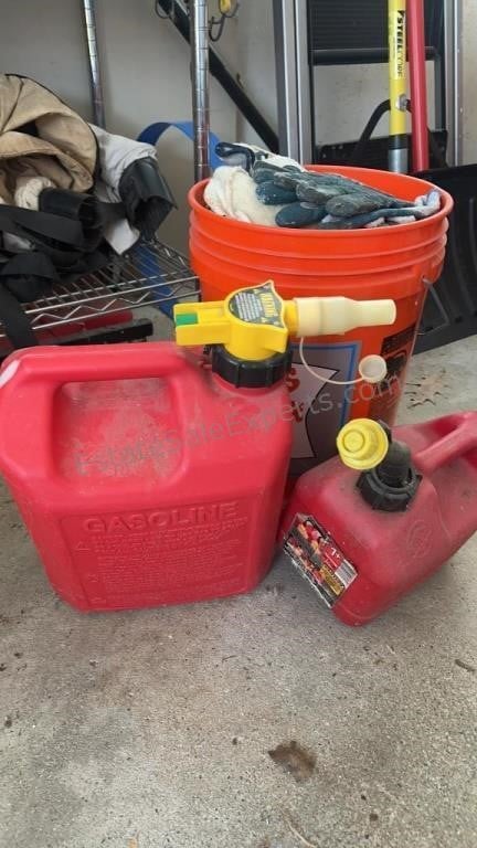 Two gas cans, bucket, full of work gloves