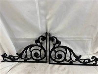 Pair of black painted heavy cast iron shelf