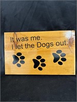 15” by 9-1/2” “ I LET THE DOGS OUT” plaque